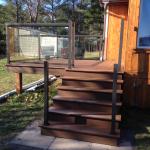 AFTER PICTURE OF THE NEW COMPOSITE DECK WITH REGAL ALUMINUM RAILING SYSTEM