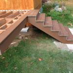 AFTER PICTURE OF THE NEW COMPOSITE DECK AND NEW STAIRS WITH COMPOSITE STEPS